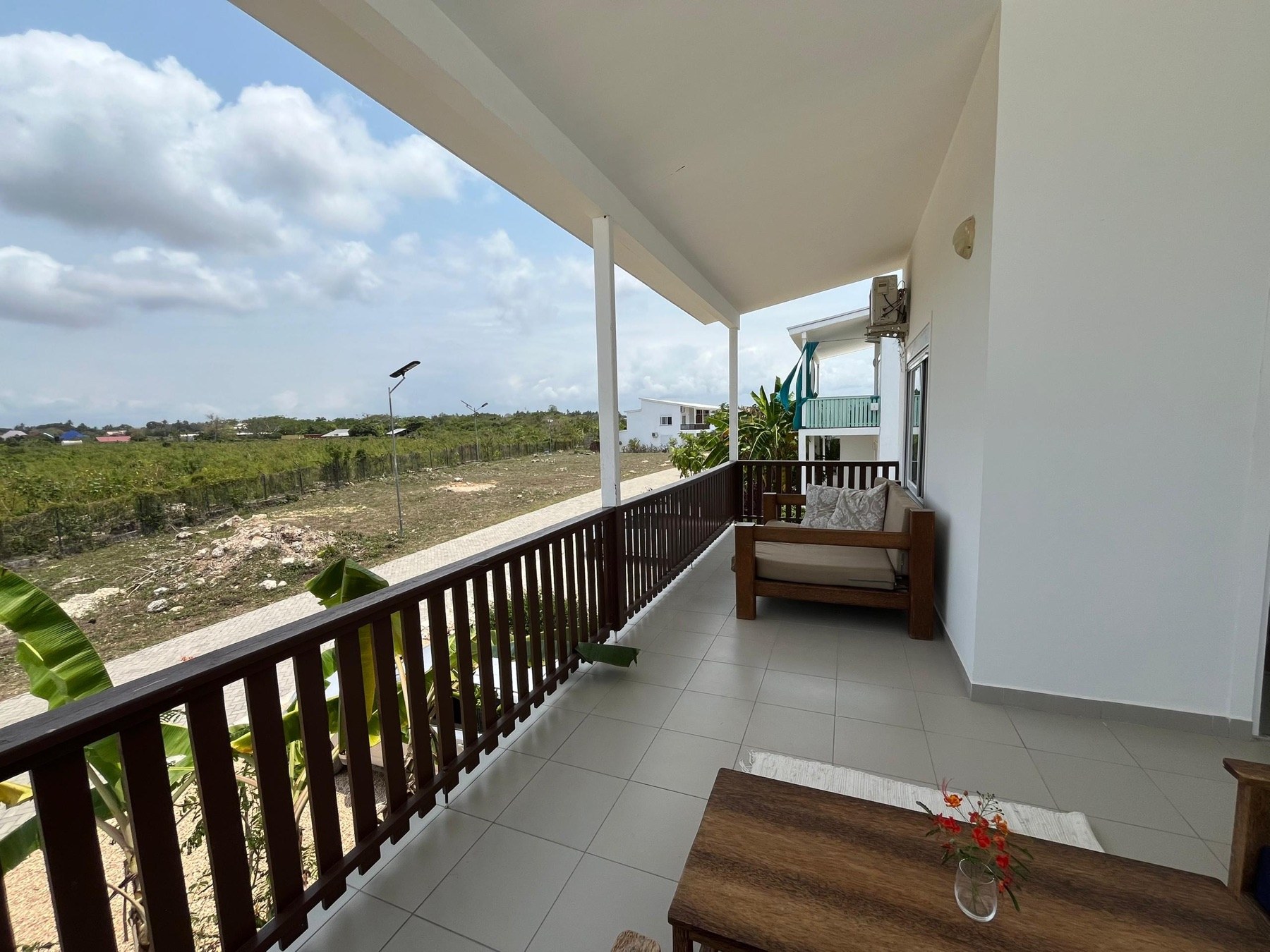 Wide veranda · Green views